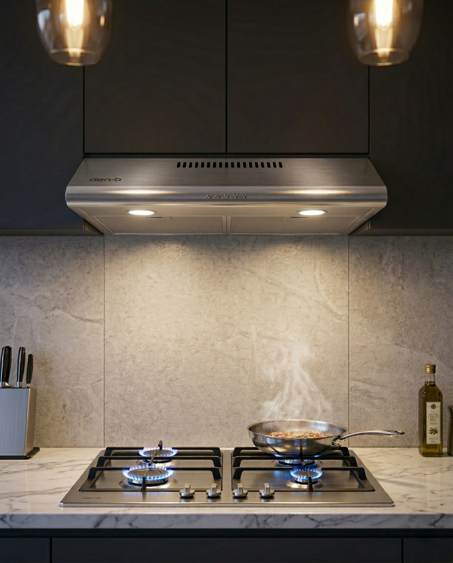 Modern kitchen with gas stove and stainless steel range hood.