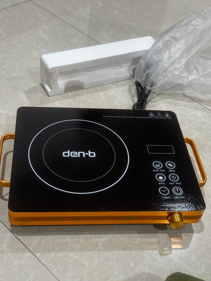 Induction cooktop with brand logo on a tiled floor